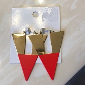 Orange and gold earrings.